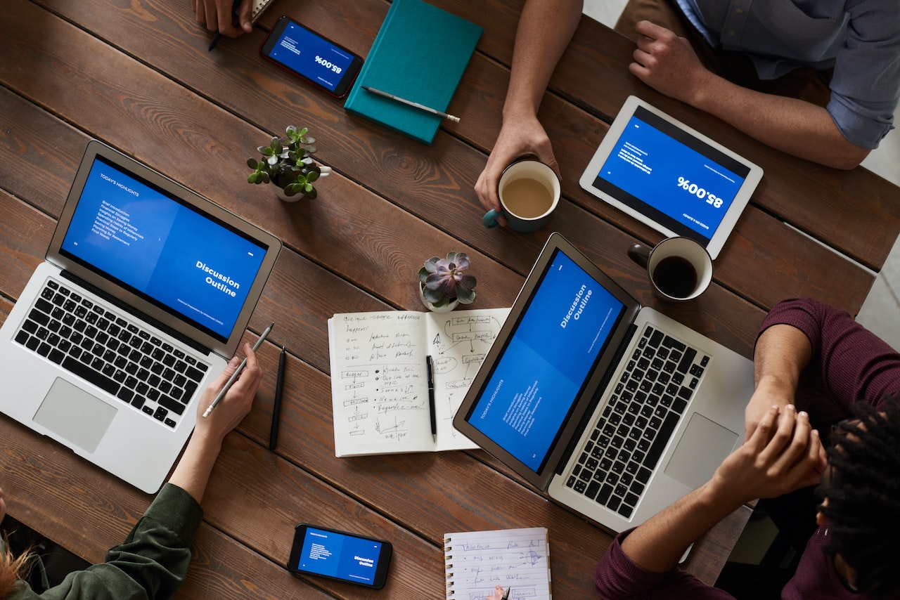 breaking-down-the-strategy-in-table-with-laptops